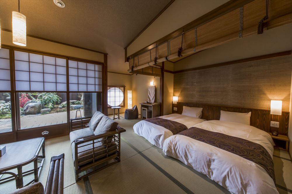 Inishie no Yado Keiun_Japanese-Western suite (with indoor and open-air baths). A premium guest room in the main building.